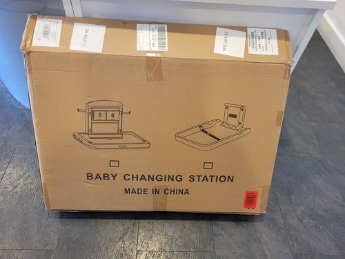 Wall mounted baby changing